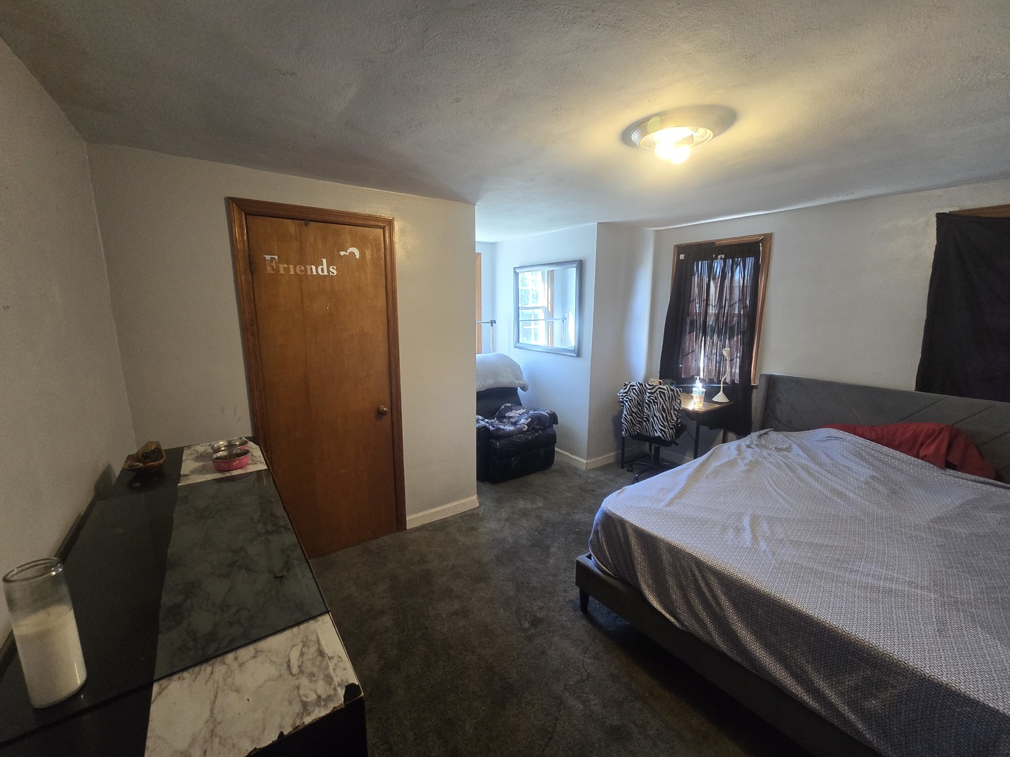 566 Hirsch Avenue Calumet City, IL 60409 - Photo 20 of 29 a bedroom with a bed and window