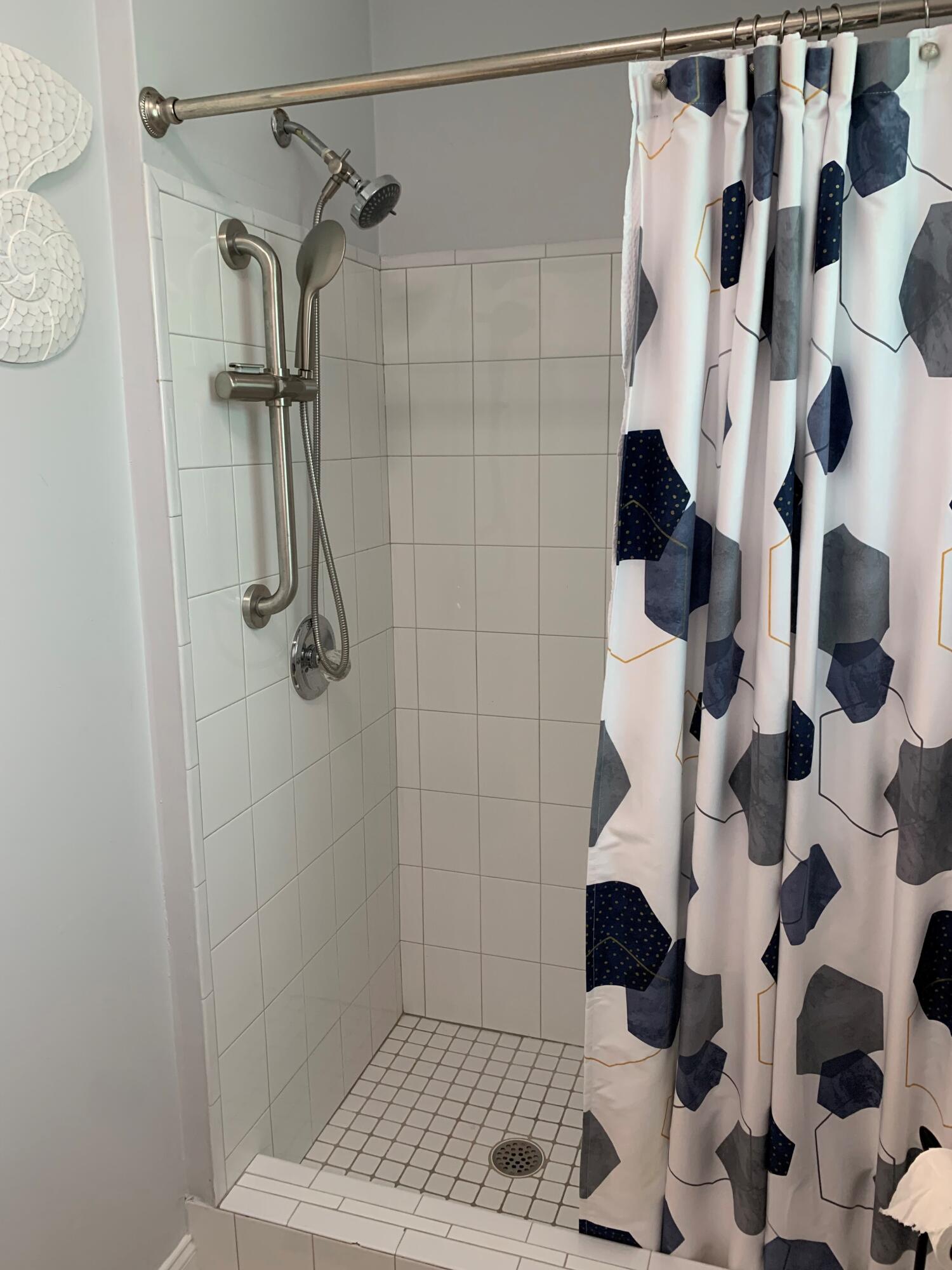 112 Captains Court Tavernier, FL 33070 - Photo 22 of 41 a bathroom with a shower and a toilet