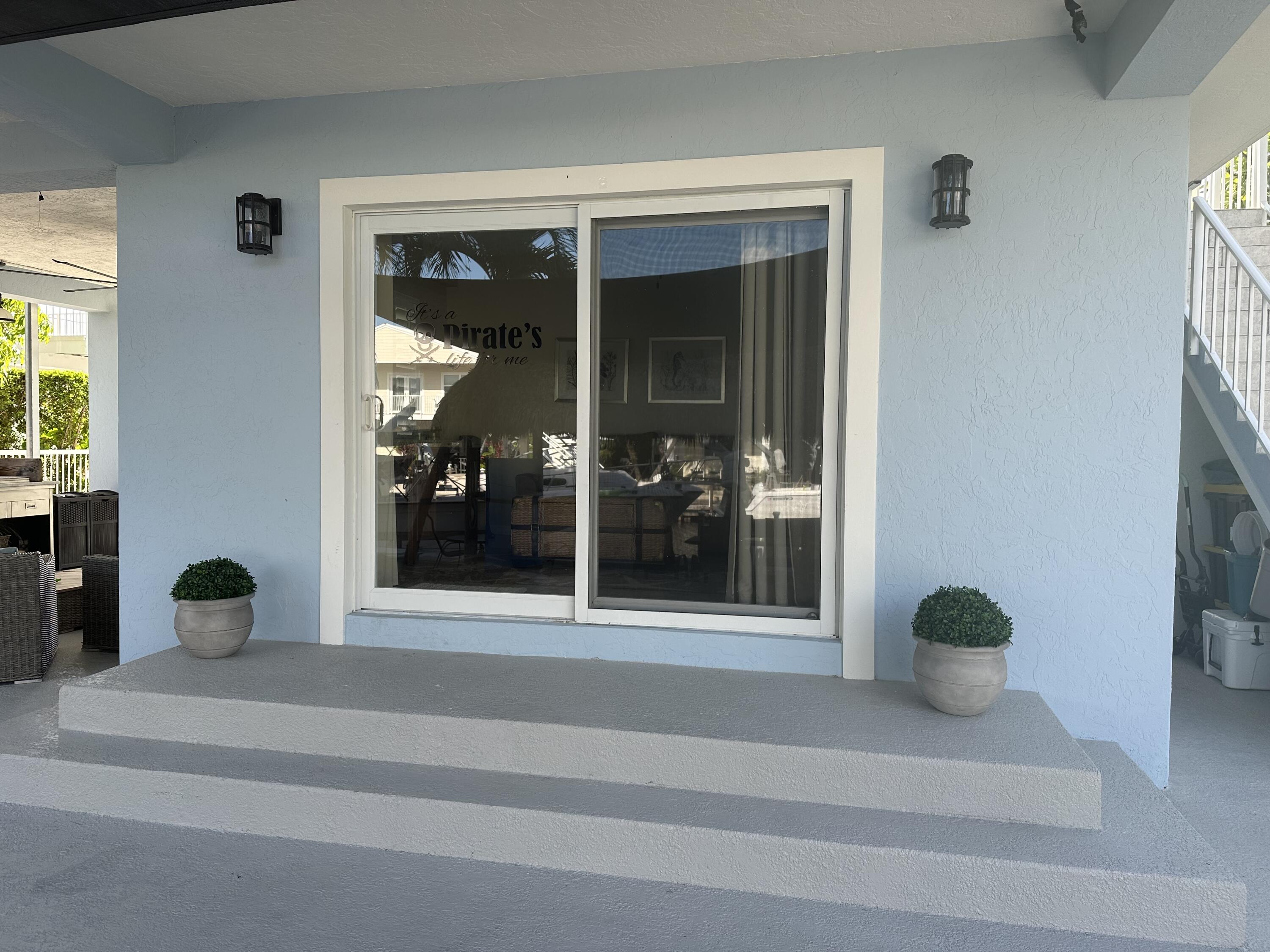 112 Captains Court Tavernier, FL 33070 - Photo 27 of 41 a view of a door and a window