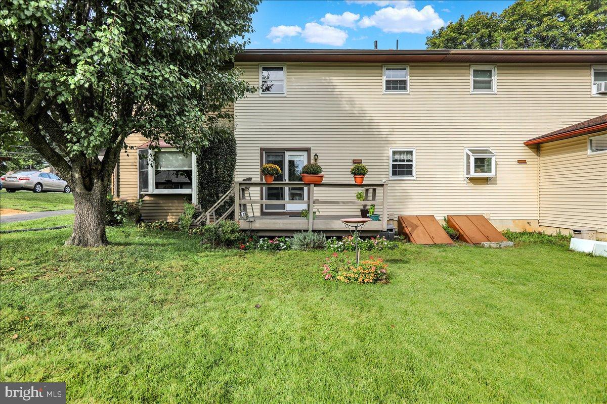226 West Ruth Avenue Robesonia, PA 19551 - Photo 32 of 32 Charming backyard retreat with lush greenery.