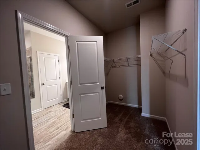 a view of a bathroom with a glass door