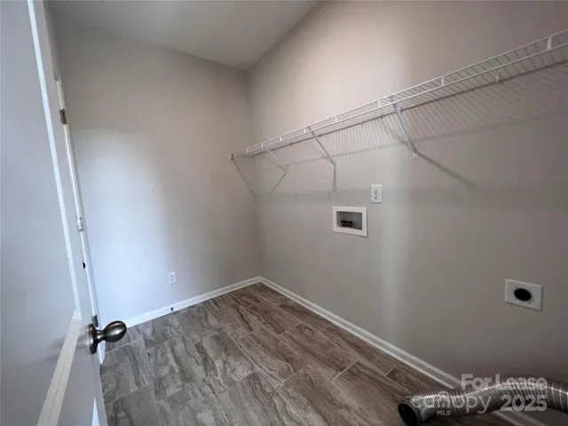 a view of a room with rack on the wall