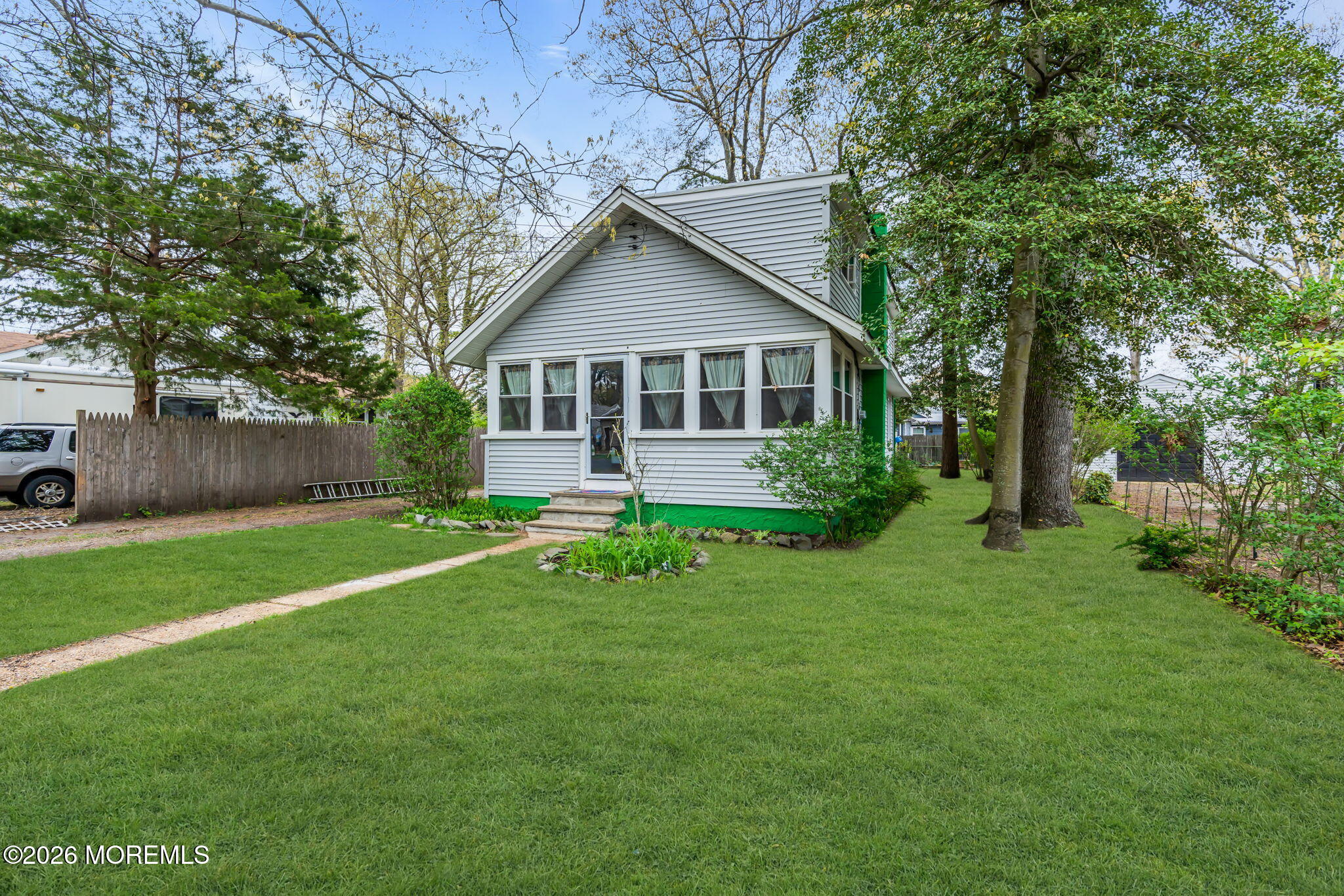 109 Martin Road Toms River, NJ 08753 - Photo 5 of 34 a view of a house with a yard and sitting area