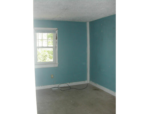8 Austin Road Billerica, MA 01821 - Photo 11 of 13 a view of an empty room with a window