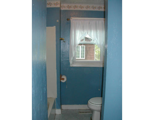 8 Austin Road Billerica, MA 01821 - Photo 8 of 13 a bathroom with a toilet