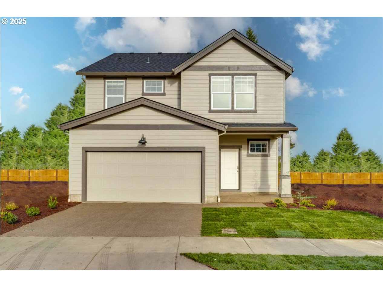 2967 U Street Springfield, OR 97477 - Photo 1 of 20 a front view of a house with a yard and garage
