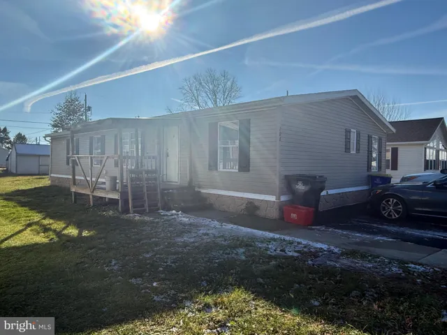 a view of a backyard of a house