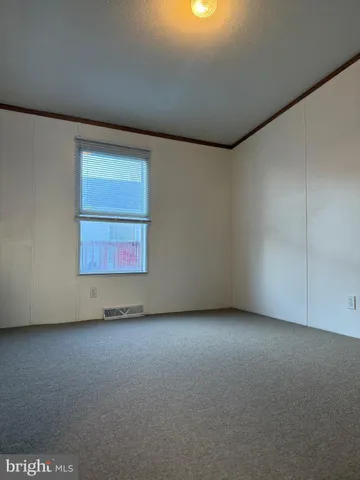 a bathroom with a double vanity sink toilet and shower