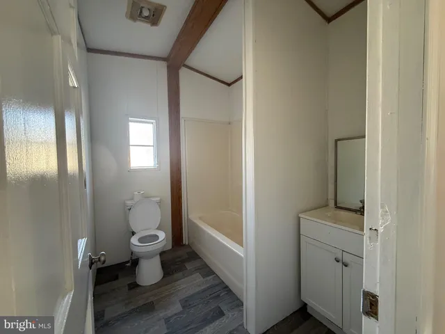 a view of a backyard of the house