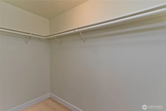 a view of a room with shelf on the wall