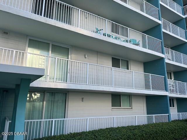 2727 North Atlantic Avenue, Unit 211 Daytona Beach, FL 32118 - Photo 28 of 38 a view of a house with a balcony
