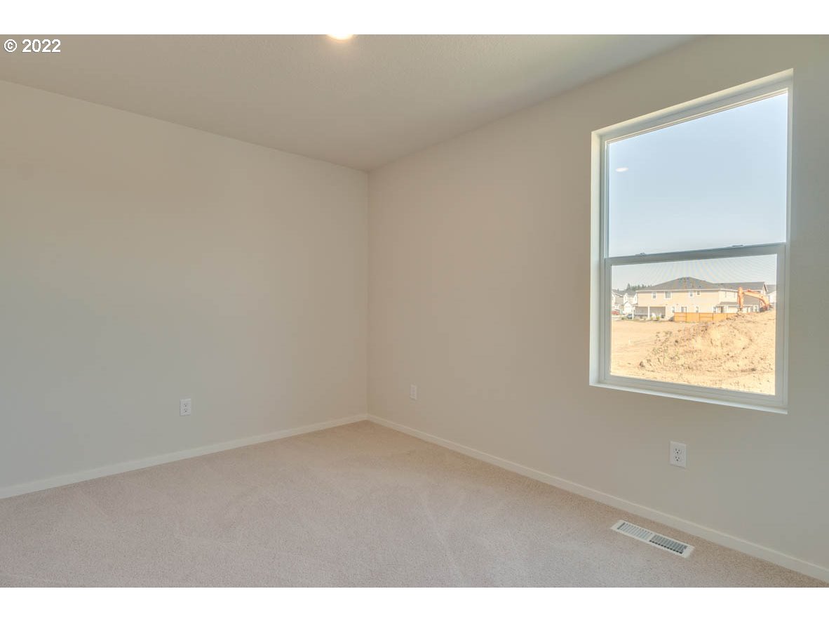 2945 North 3rd Way Ridgefield, WA 98642 - Photo 17 of 30 a view of an empty room and a window