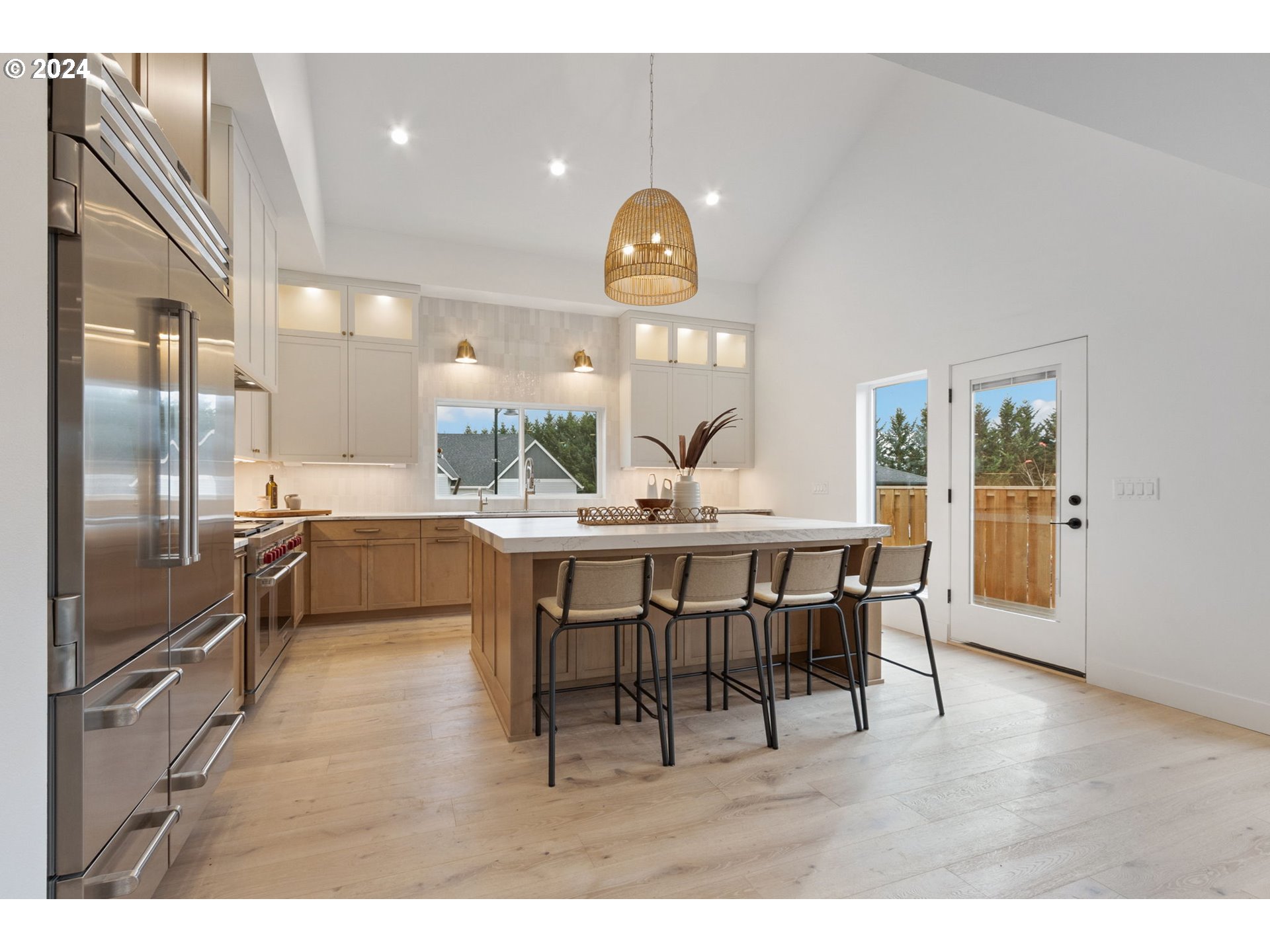 23141 Southwest Curry Ridge Drive Sherwood, OR 97140 - Photo 14 of 47 a view of a dining room with furniture window and wooden floor