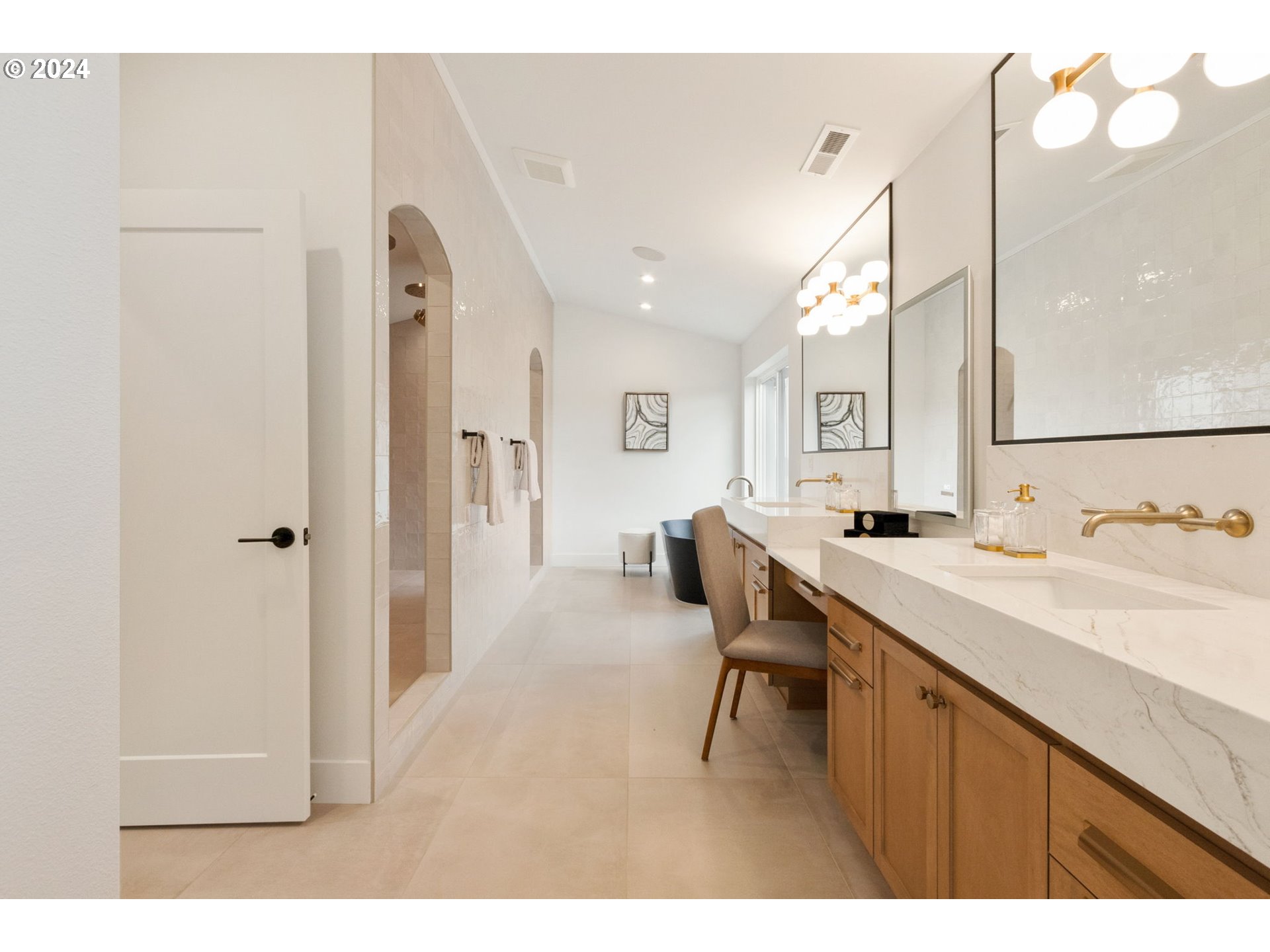 23141 Southwest Curry Ridge Drive Sherwood, OR 97140 - Photo 25 of 47 a bathroom with a sink vanity and a mirror