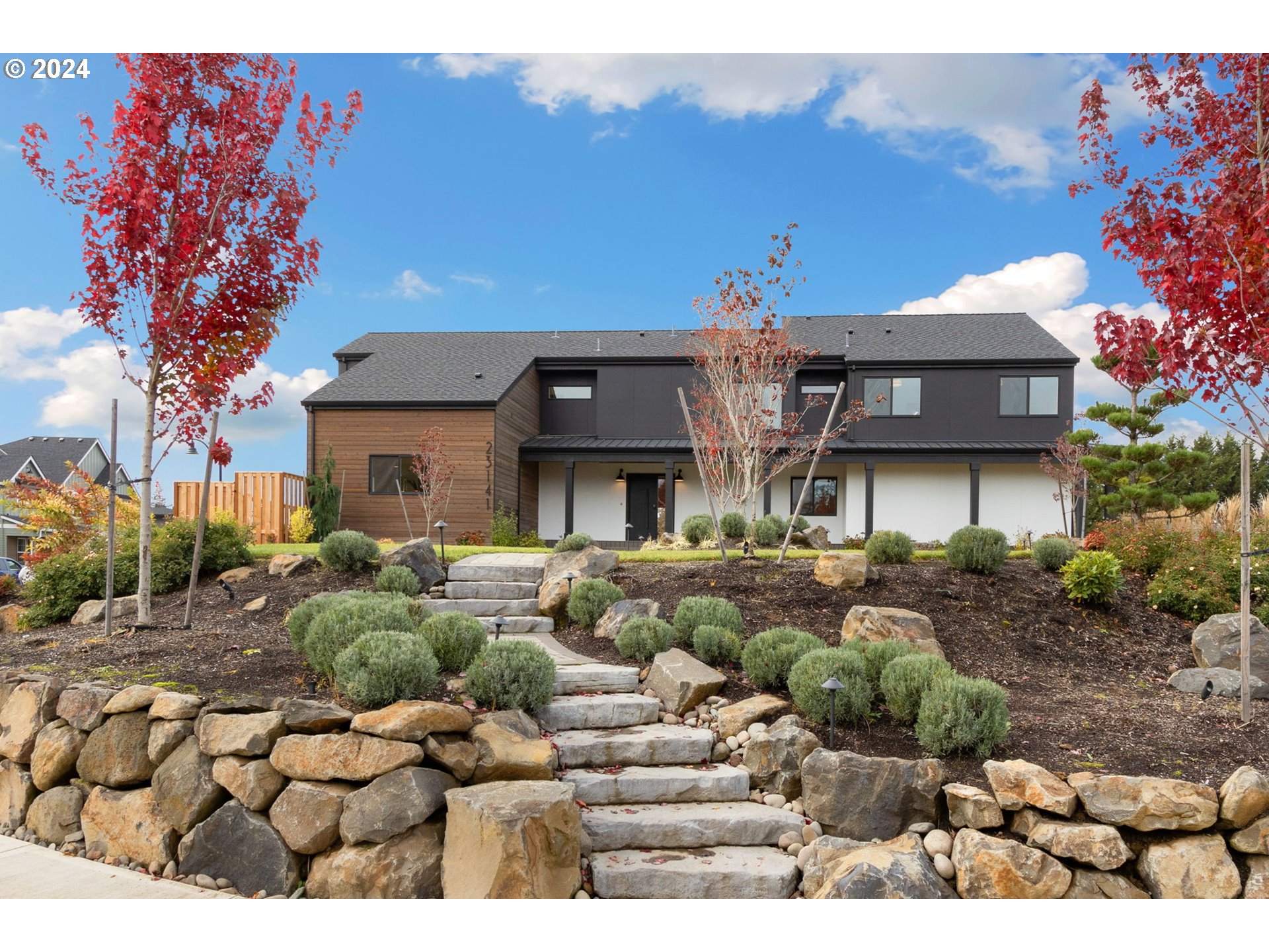 23141 Southwest Curry Ridge Drive Sherwood, OR 97140 - Photo 3 of 47 a view of a house with a patio