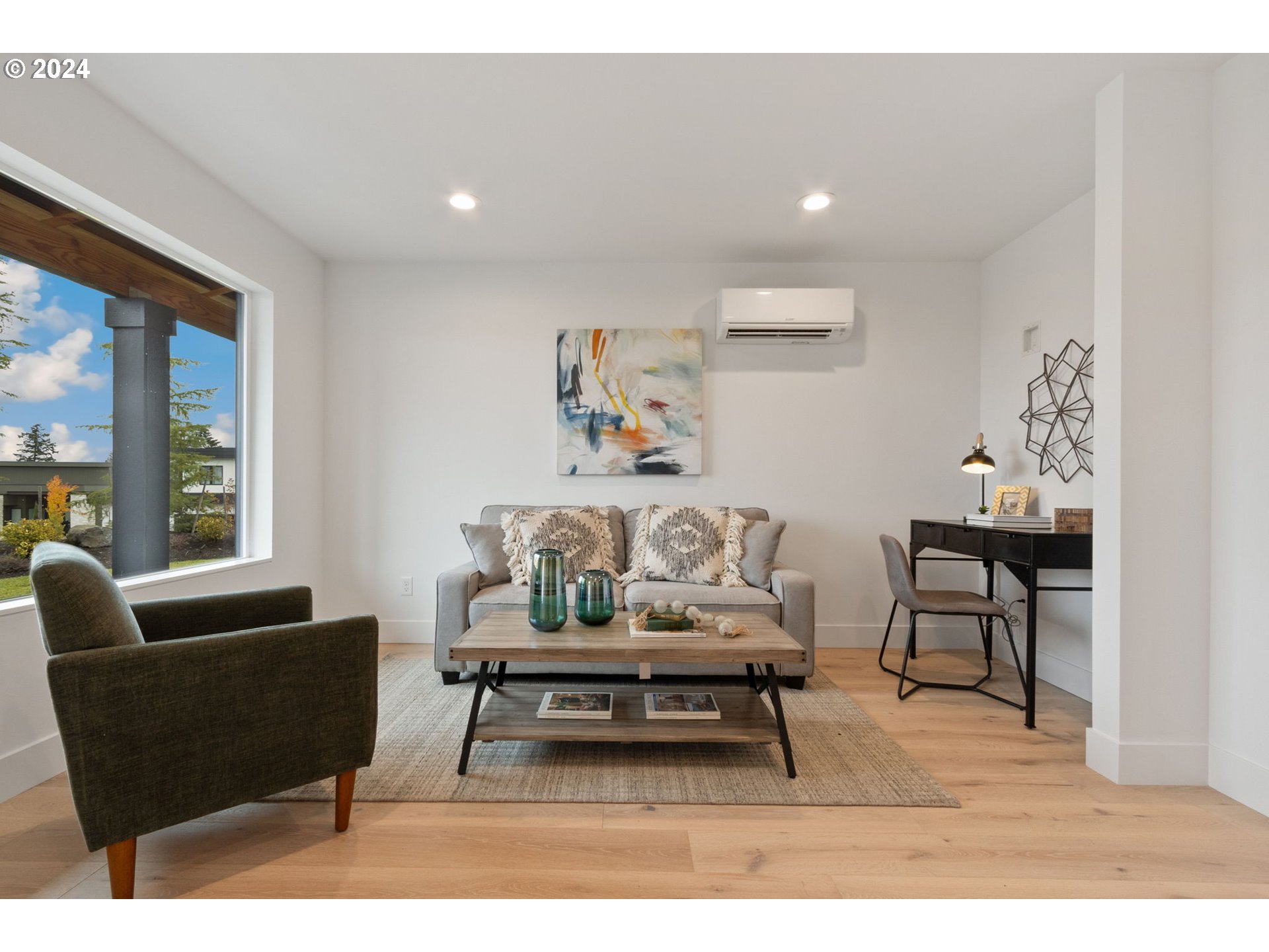23141 Southwest Curry Ridge Drive Sherwood, OR 97140 - Photo 38 of 47 a living room with furniture and a potted plant