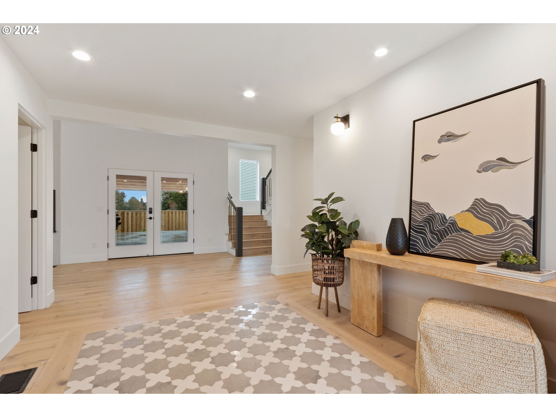 23141 Southwest Curry Ridge Drive Sherwood, OR 97140 - Photo 4 of 47 a living room with furniture and potted plant