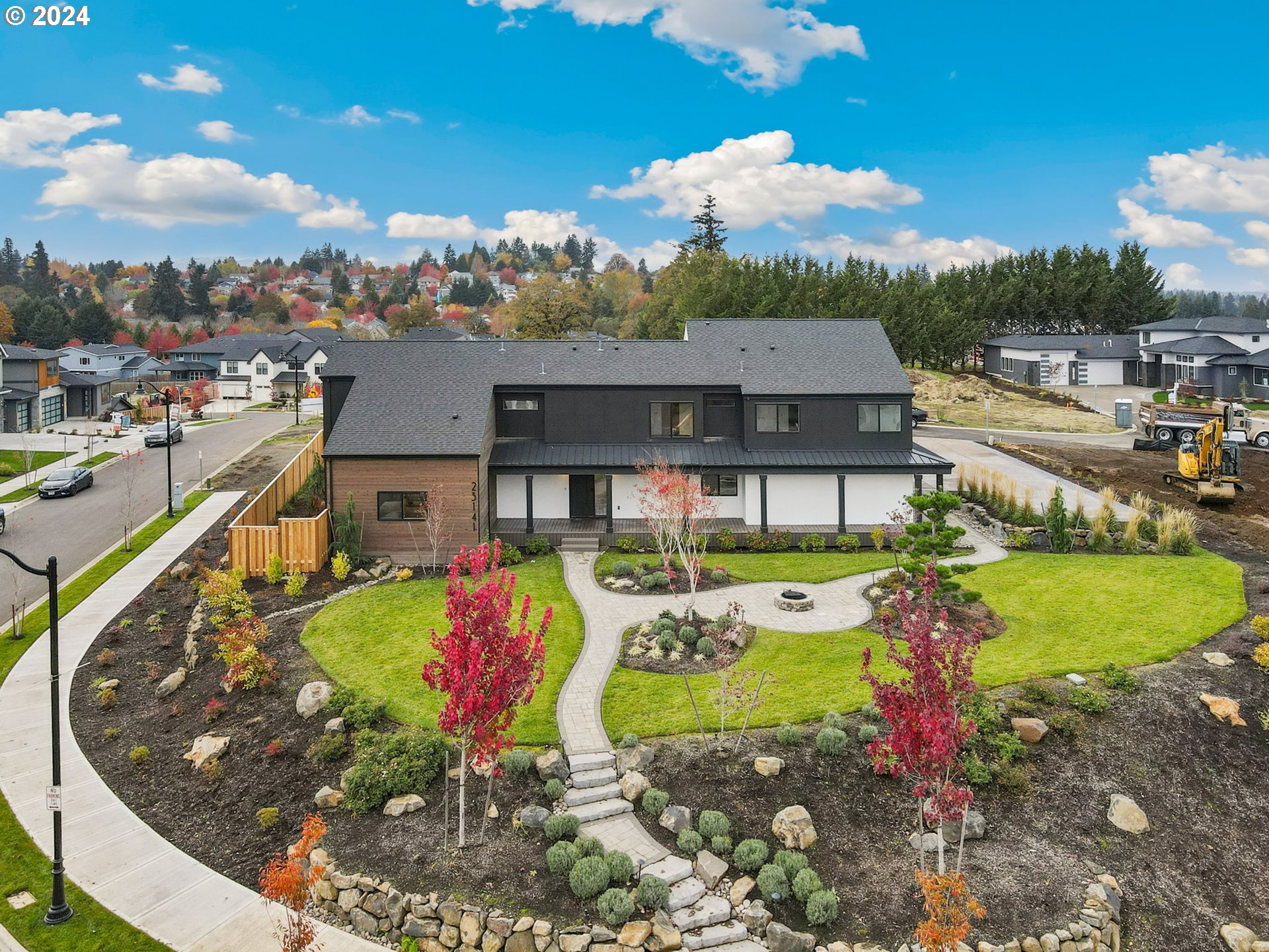 23141 Southwest Curry Ridge Drive Sherwood, OR 97140 - Photo 44 of 47 an aerial view of a house with a swimming pool outdoor seating