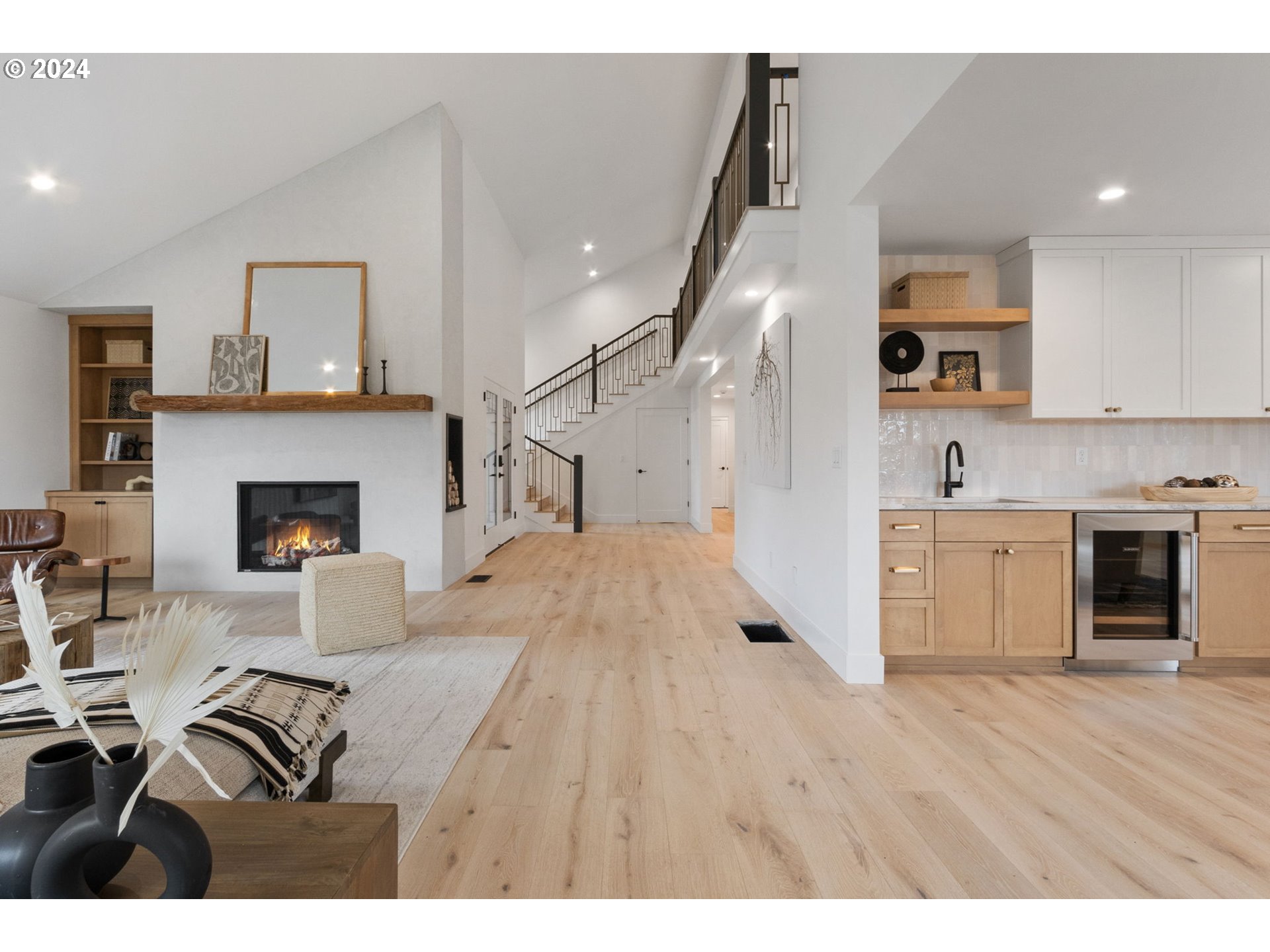 23141 Southwest Curry Ridge Drive Sherwood, OR 97140 - Photo 9 of 47 a living room with furniture and a fireplace