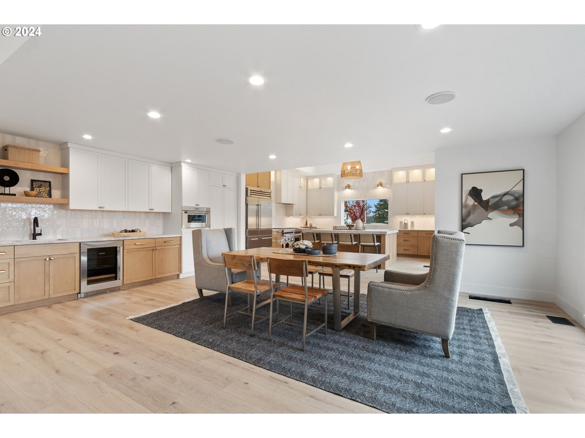 23141 Southwest Curry Ridge Drive Sherwood, OR 97140 - Photo 10 of 47 a living room with stainless steel appliances furniture kitchen view and a dining table