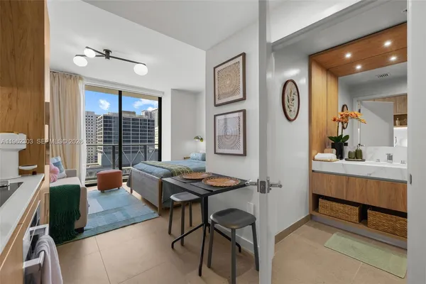 a living room with furniture and a window