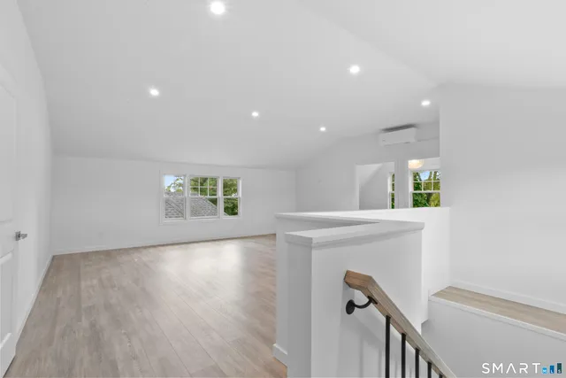 a bathroom with a sink and shower