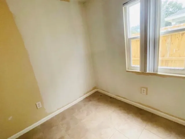 an empty room with a window