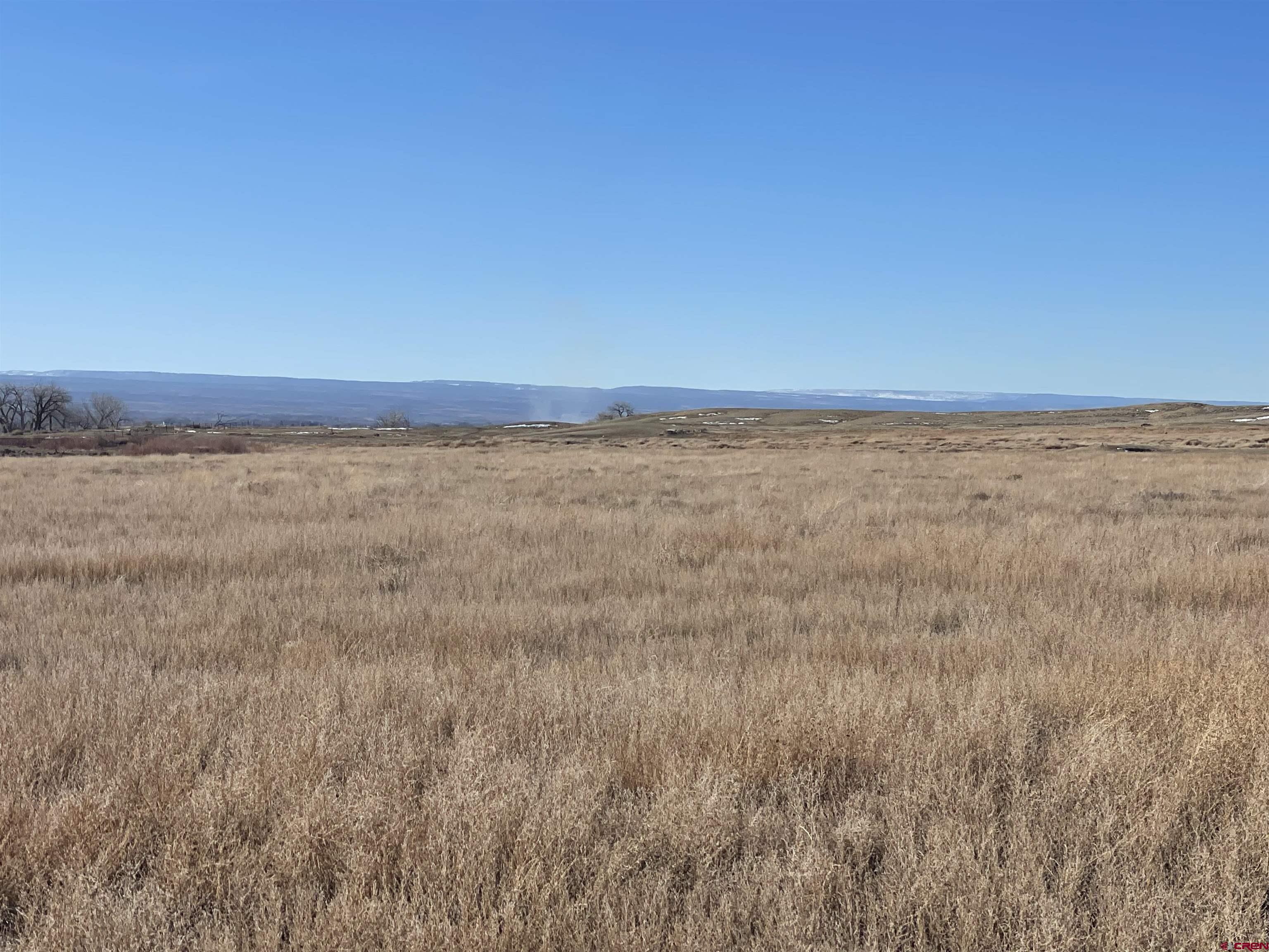 64233 Peach Valley Road Montrose, CO 81401 - Photo 18 of 26 a view of beach and an ocean