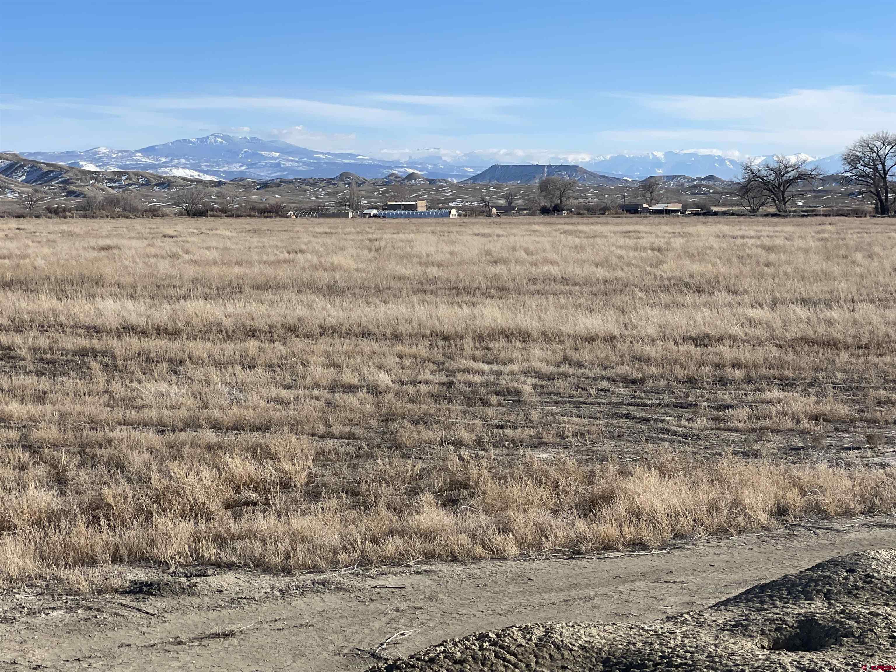 64233 Peach Valley Road Montrose, CO 81401 - Photo 3 of 26 a view of lake and mountain