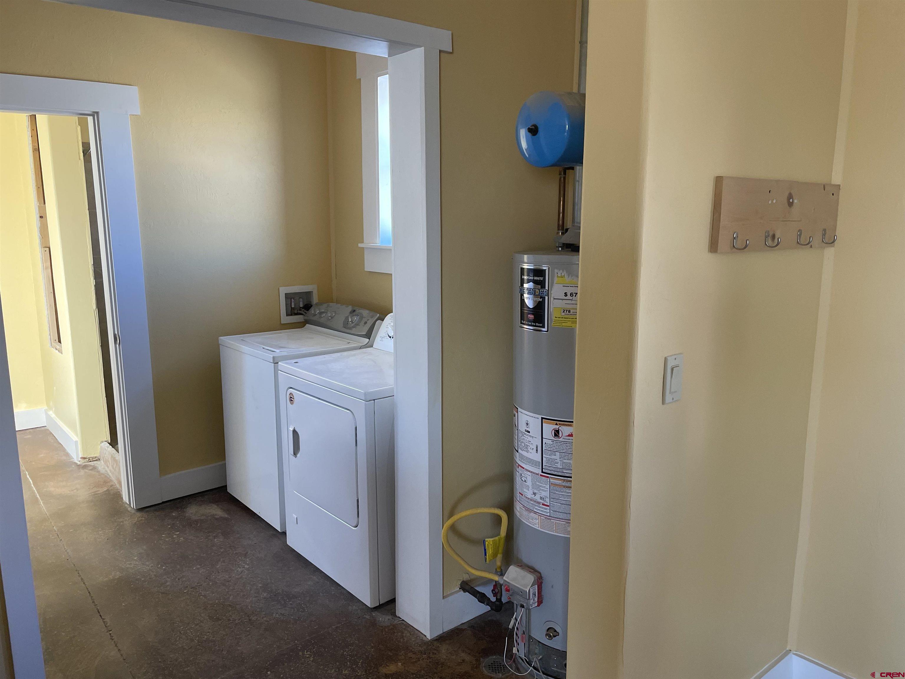 64233 Peach Valley Road Montrose, CO 81401 - Photo 6 of 26 a bathroom with a granite countertop sink and a mirror