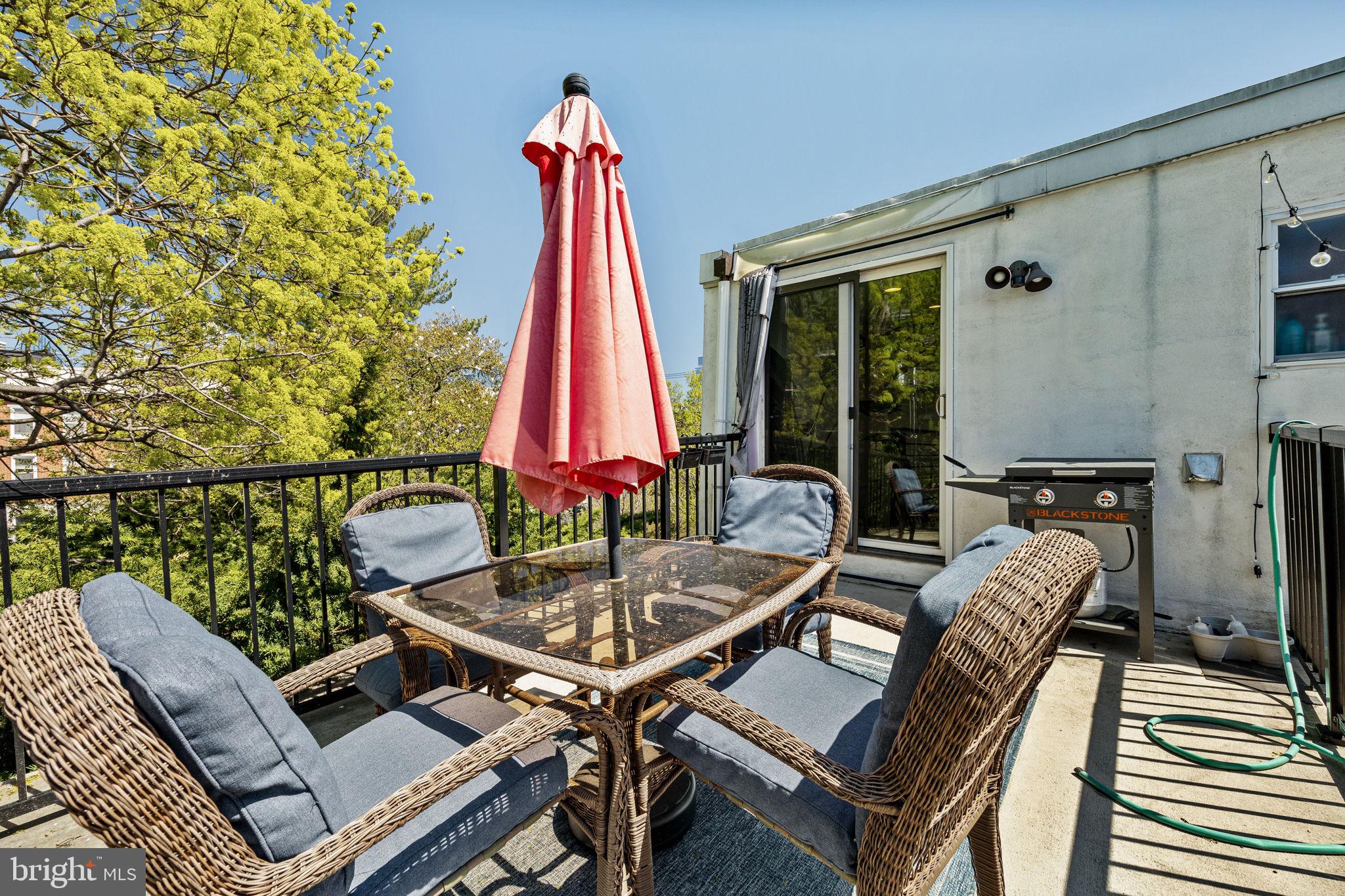 744 South 19th Street Philadelphia, PA 19146 - Photo 13 of 29 a view of a patio with a dining table and chairs