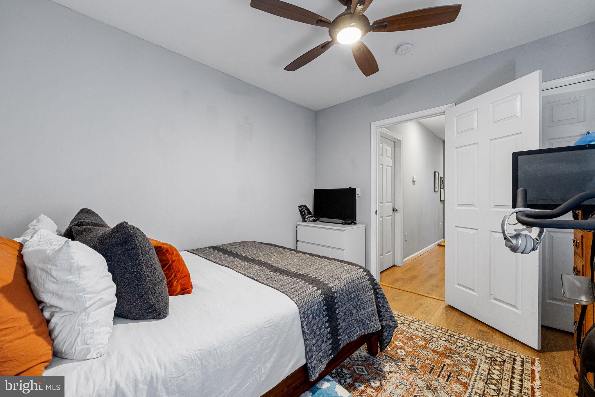 744 South 19th Street Philadelphia, PA 19146 - Photo 26 of 29 a bedroom with a bed and a flat screen tv
