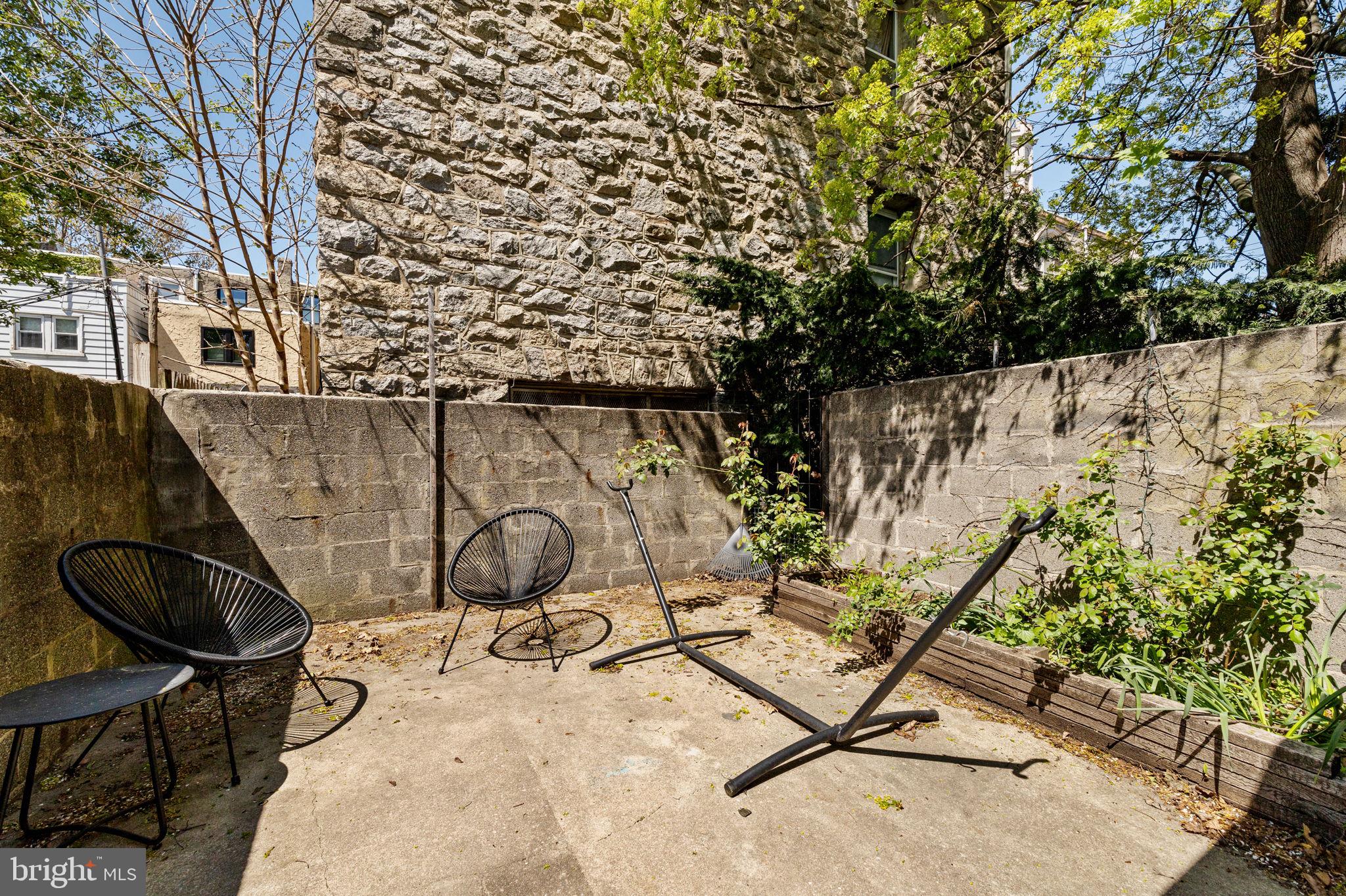 744 South 19th Street Philadelphia, PA 19146 - Photo 28 of 29 a view of a yard with chairs