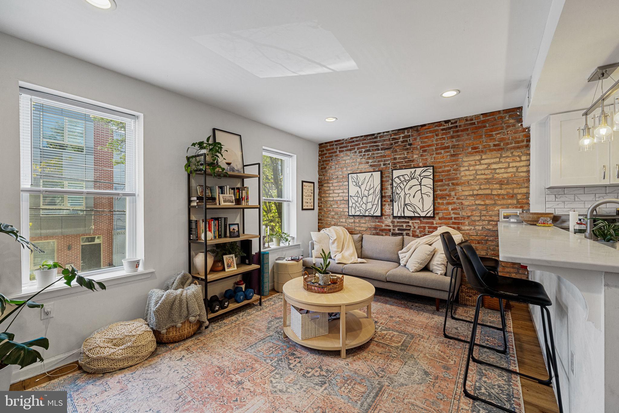 744 South 19th Street Philadelphia, PA 19146 - Photo 3 of 29 a living room with furniture and a book shelf
