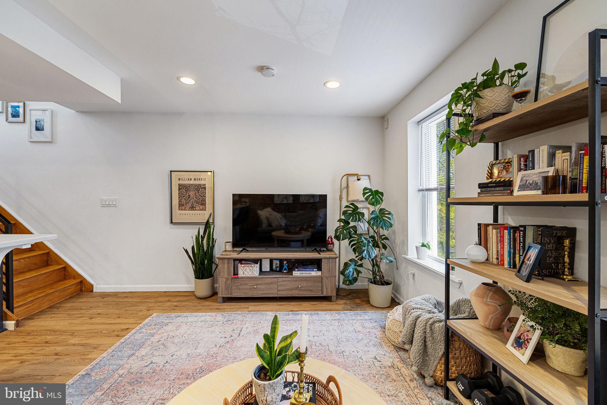744 South 19th Street Philadelphia, PA 19146 - Photo 5 of 29 a living room with furniture and a flat screen tv