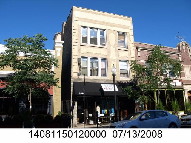 5314 North Clark Street, Unit 1R Chicago, IL 60640 - Photo 1 of 1 a black and white photo of a building