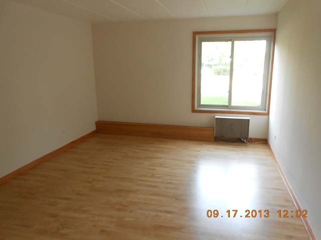18 East Old Willow Road, Unit 106N Prospect Heights, IL 60070 - Photo 9 of 12 a view of an empty room with a window