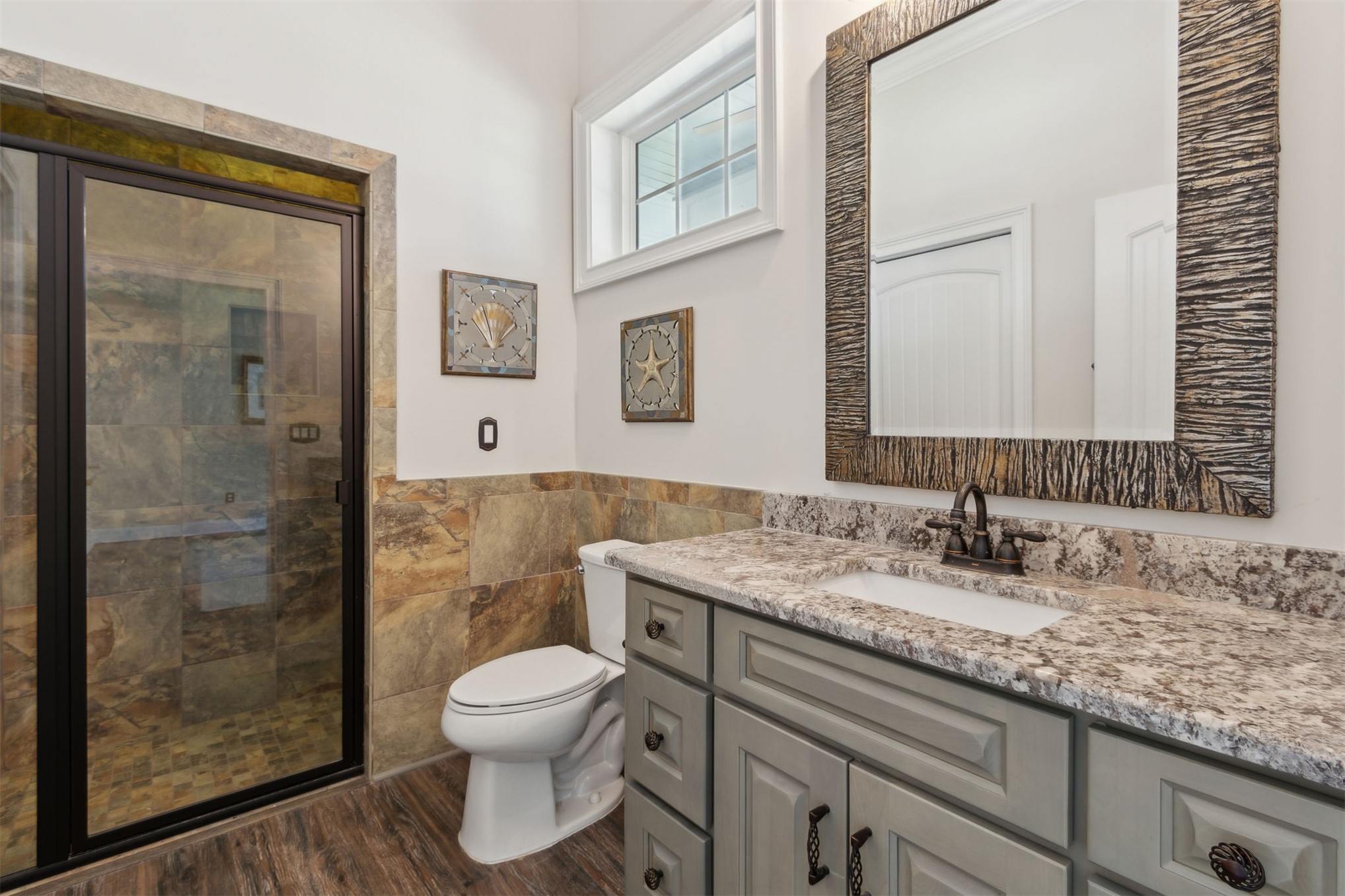 1900 Sycamore Lane Fernandina Beach, FL 32034 - Photo 21 of 54 a bathroom with a granite countertop sink toilet a mirror and shower