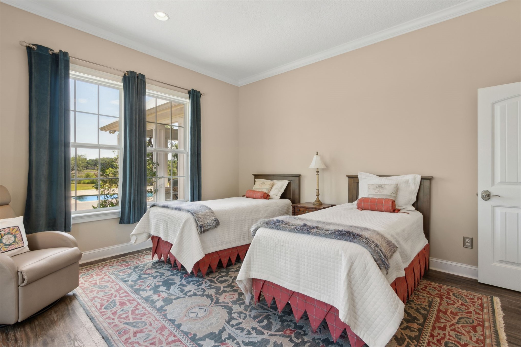 1900 Sycamore Lane Fernandina Beach, FL 32034 - Photo 22 of 54 a bedroom with two beds and a couch next to a window