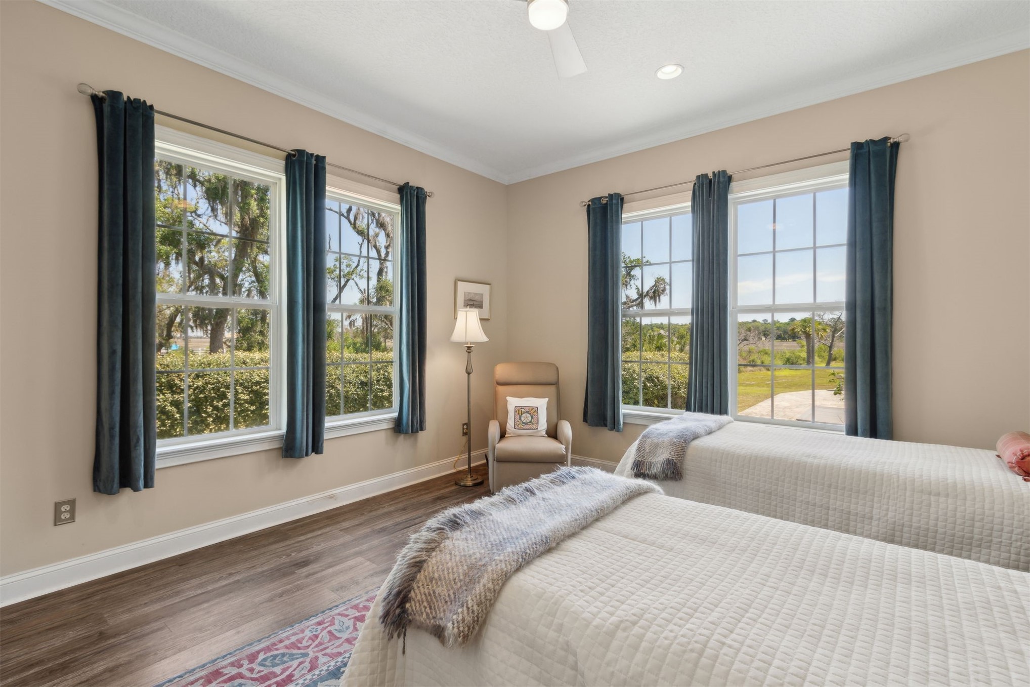 1900 Sycamore Lane Fernandina Beach, FL 32034 - Photo 23 of 54 a bedroom with a large bed and a large window