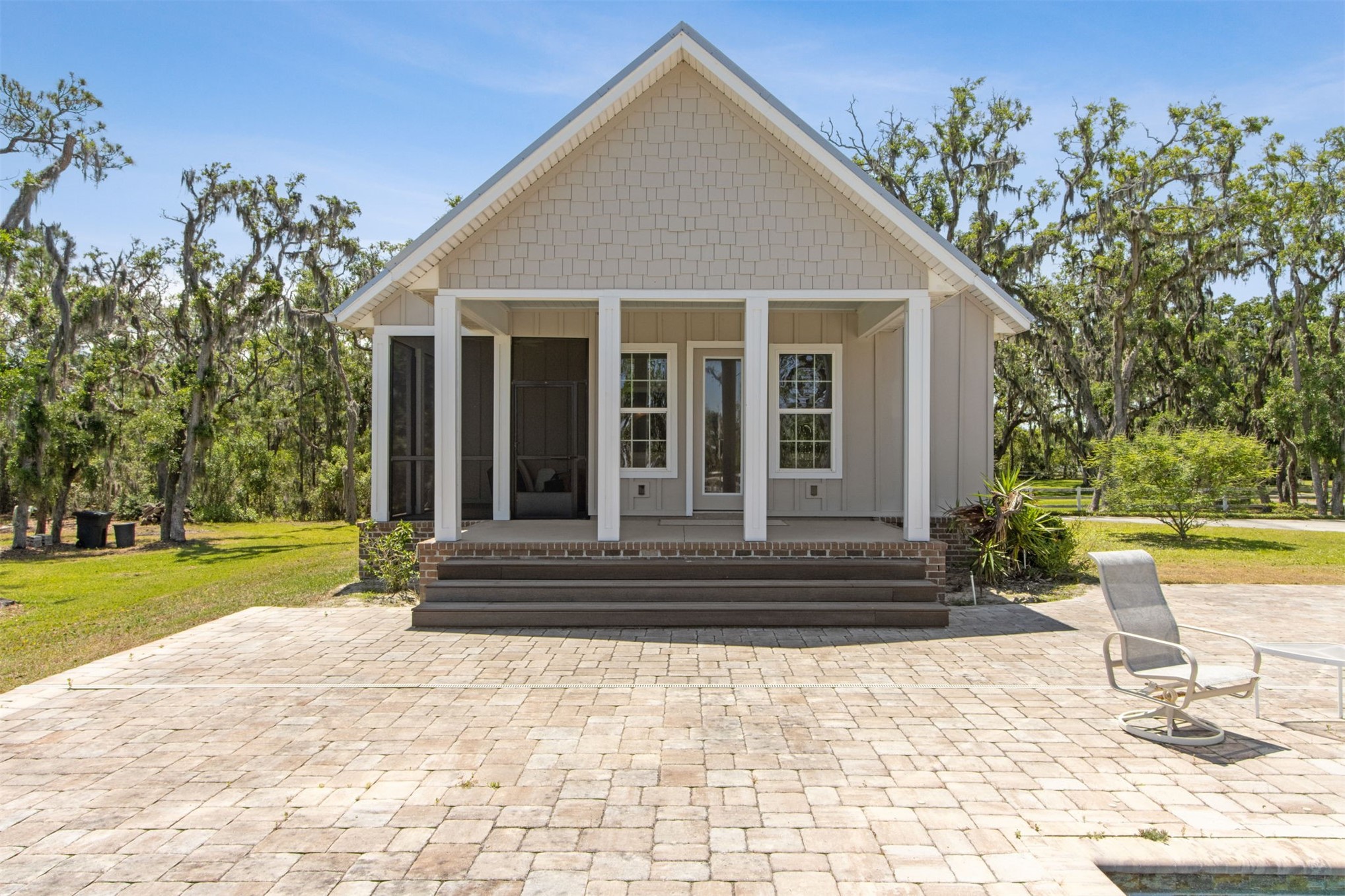 1900 Sycamore Lane Fernandina Beach, FL 32034 - Photo 30 of 54 a front view of a house with garden