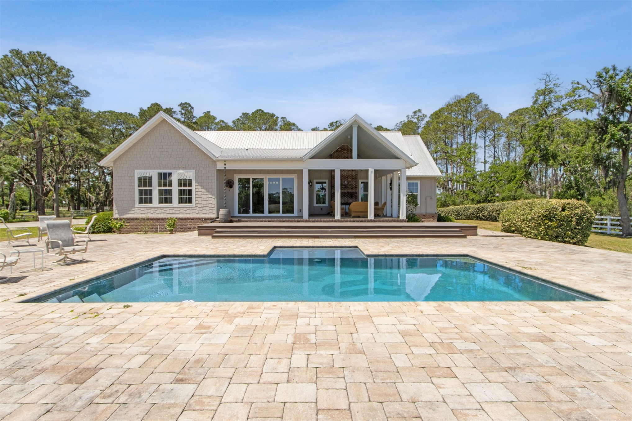 1900 Sycamore Lane Fernandina Beach, FL 32034 - Photo 46 of 54 a view of a house with a swimming pool and sitting area