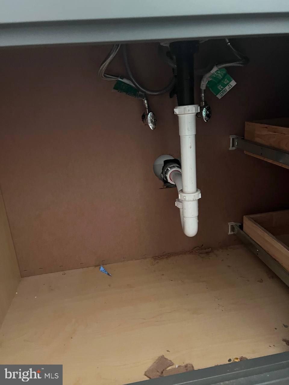9613 Kendrick Road North Chesterfield, VA 23236 - Photo 61 of 66 Under-sink plumbing setup revealed.