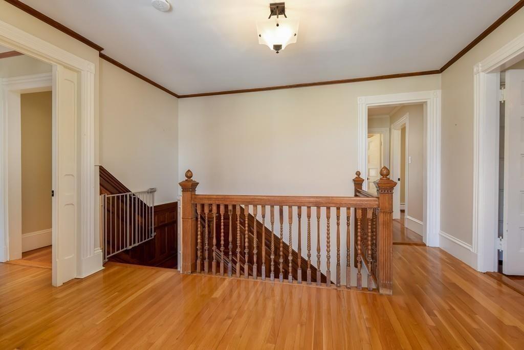 41 University Road Brookline, MA 02445 - Photo 24 of 37 a view of hallway with wooden floor
