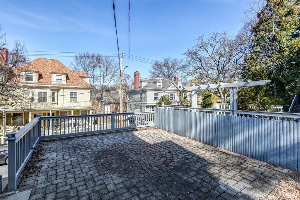 41 University Road Brookline, MA 02445 - Photo 36 of 37 a view of residential houses with wooden fence