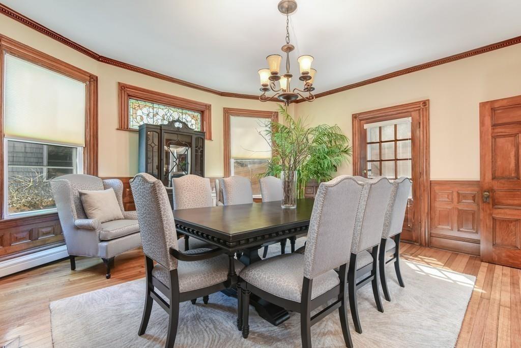41 University Road Brookline, MA 02445 - Photo 8 of 37 a view of a dining room with furniture window and wooden floor