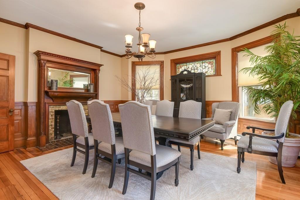 41 University Road Brookline, MA 02445 - Photo 10 of 37 a view of a dining room with furniture window and wooden floor