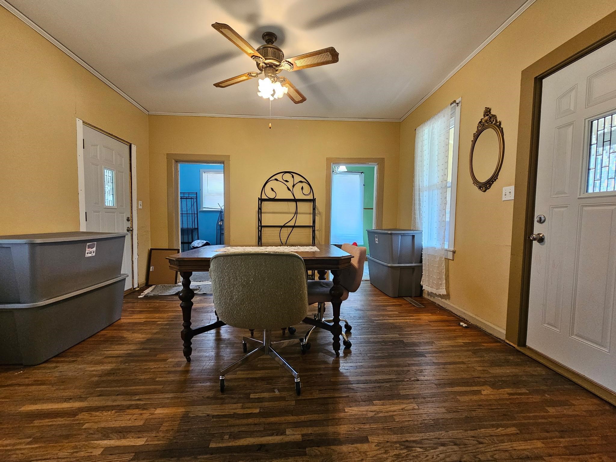 302 East Park Street Morrison, IL 61270 - Photo 3 of 10 a view of a dining room with furniture a chandelier and wooden floor