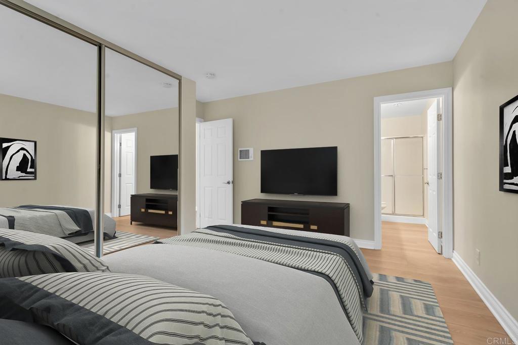 8636 Via Mallorca, Unit A La Jolla, CA 92037 - Photo 11 of 21 a bedroom with two bed and a television