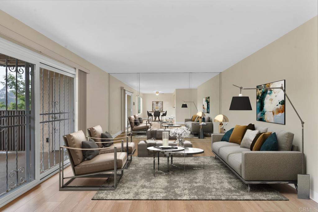 8636 Via Mallorca, Unit A La Jolla, CA 92037 - Photo 3 of 21 a living room with furniture and a large window